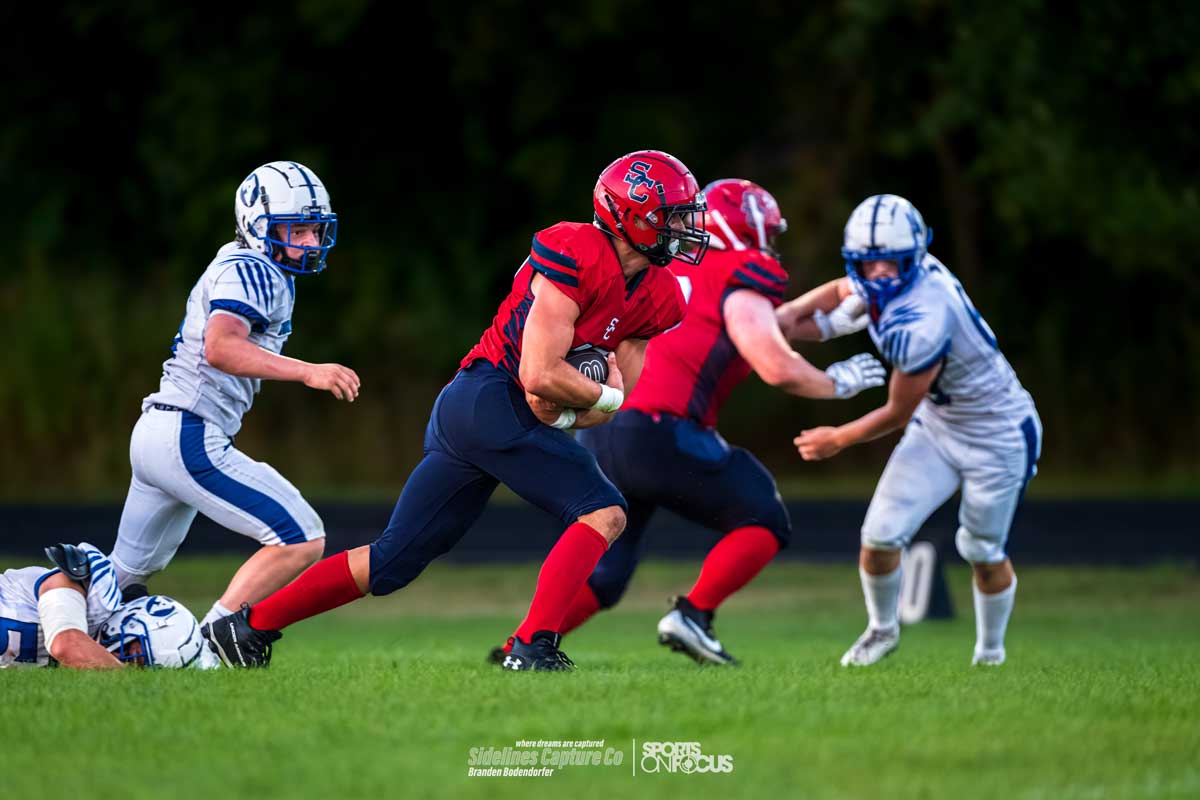 Spencer/Columbus ball carrier breaking through the Auburndale defense during a non-conference high school football game in Central Wisconsin